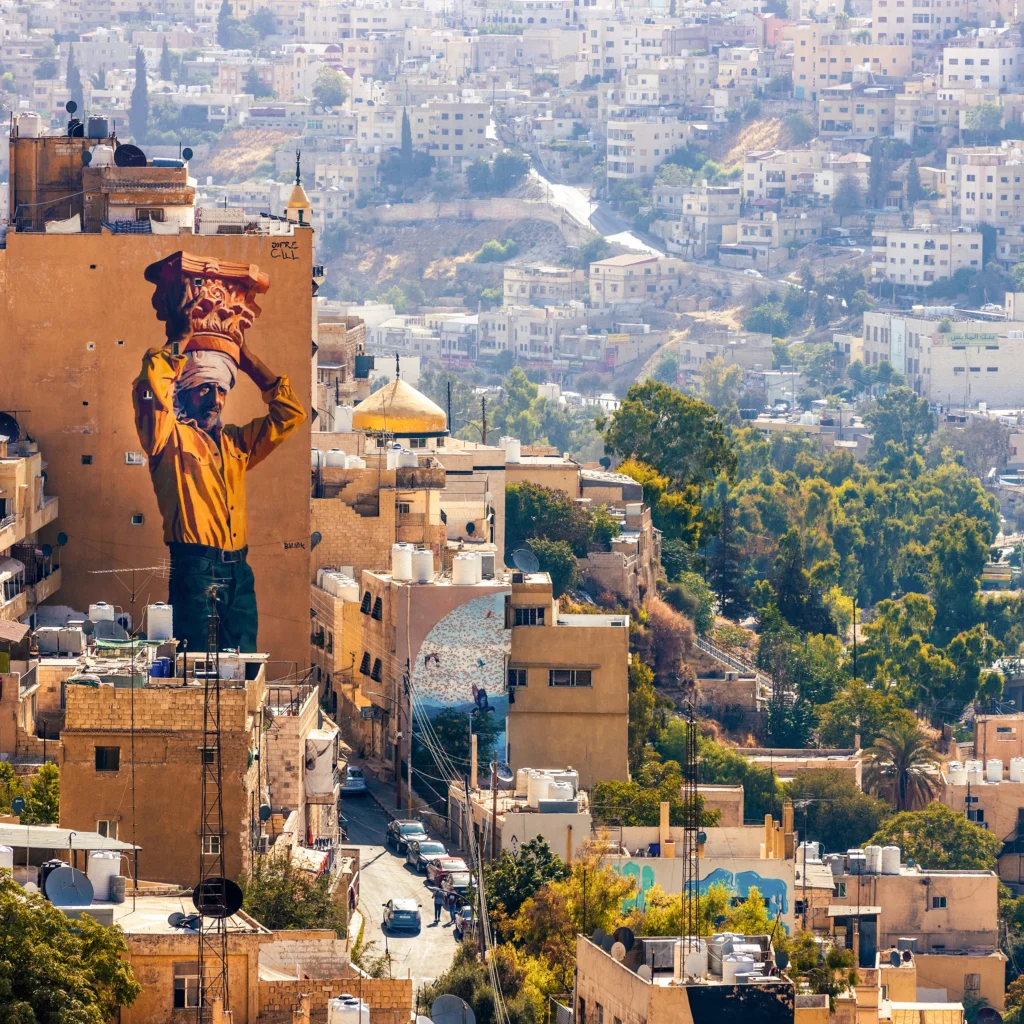 Colorful street art mural in Amman alleyway